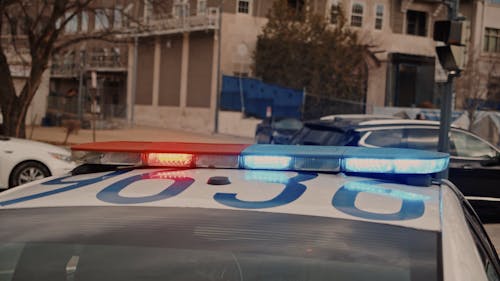 A Flashing Police Lights at the Street