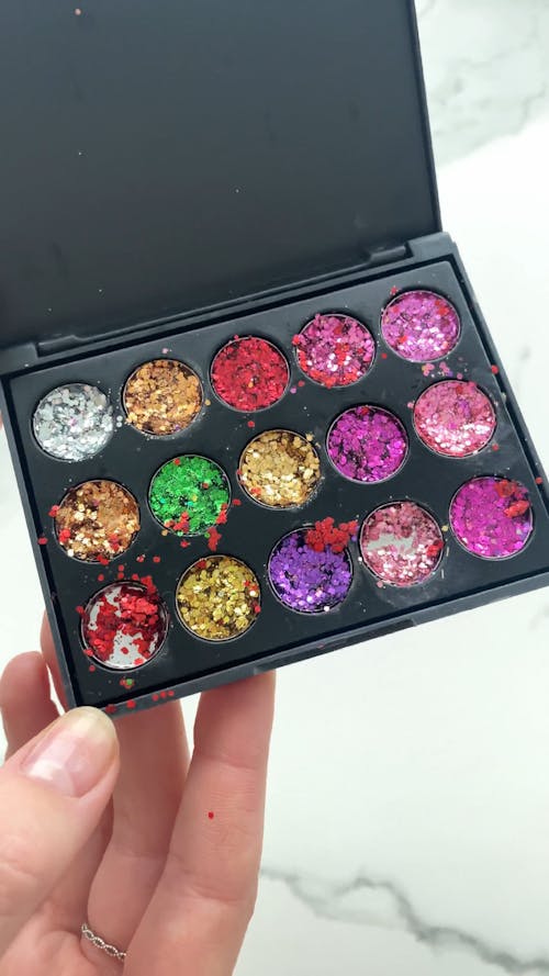 Person Holding Eyeshadow Palette