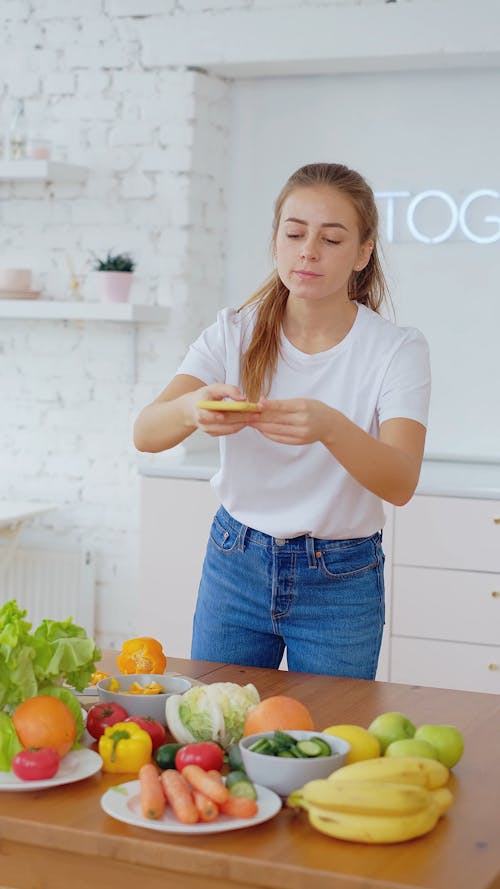 Girl Taking Pictures of Vegetables 