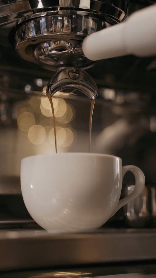 Coffee Dripping from a Coffee Machine