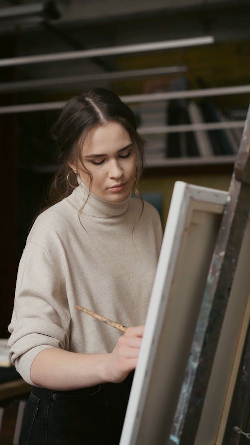 Woman Painting a Picture