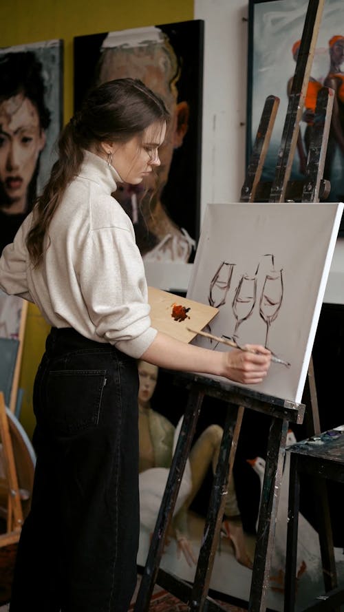 A Woman Painting on a Canvas