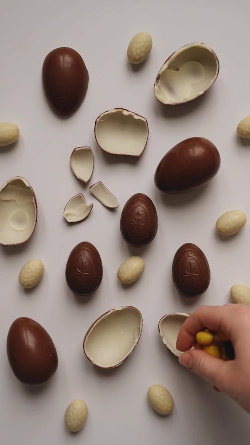 Filling Easter Eggs Halves with Candy