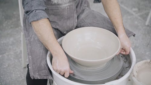 Person Making Ceramic Bowl