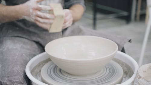 Close-up Footage of an Artisan Doing a Clay Bowl