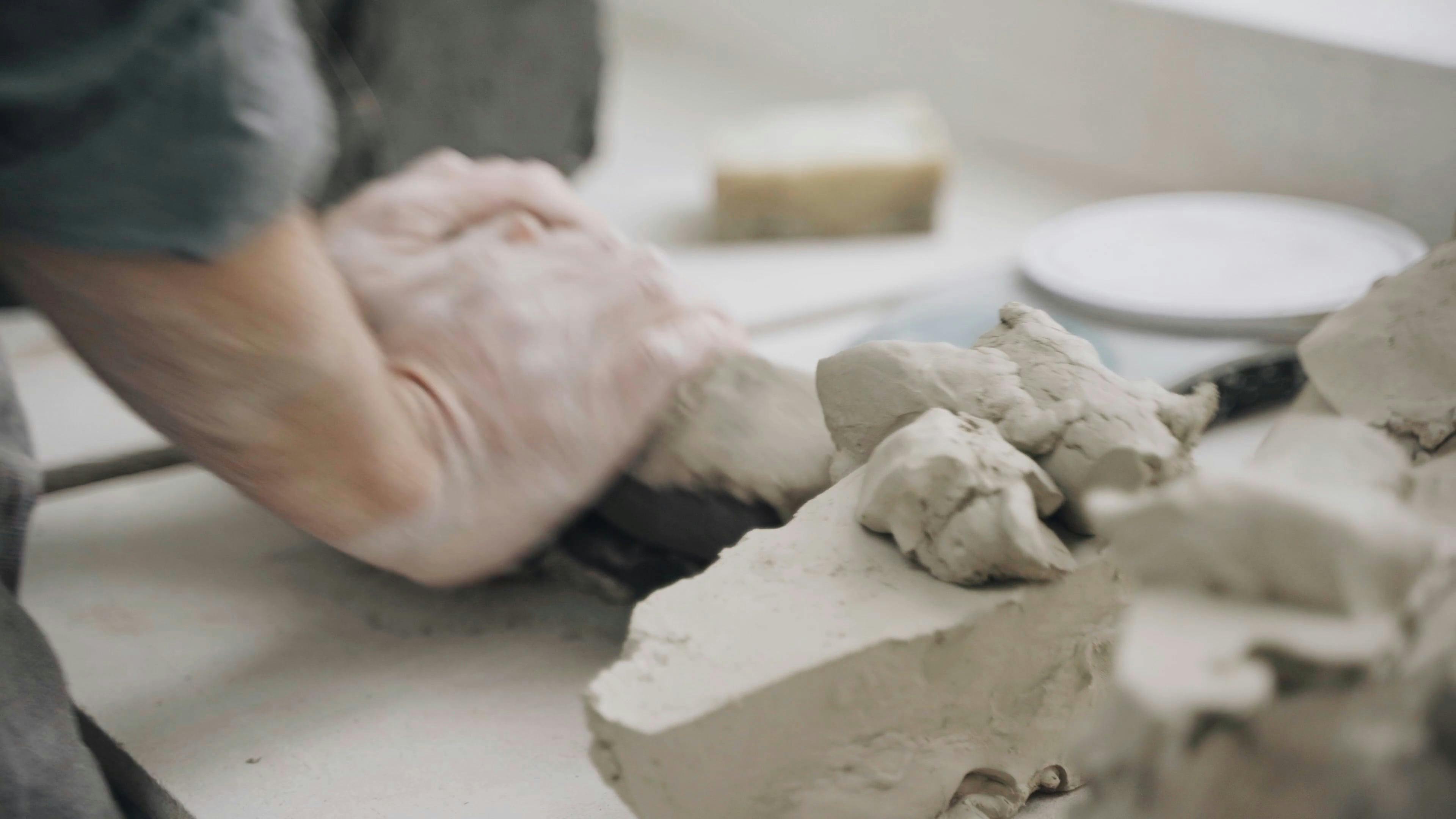 Man Kneading Clay For Pottery · Free Stock Video