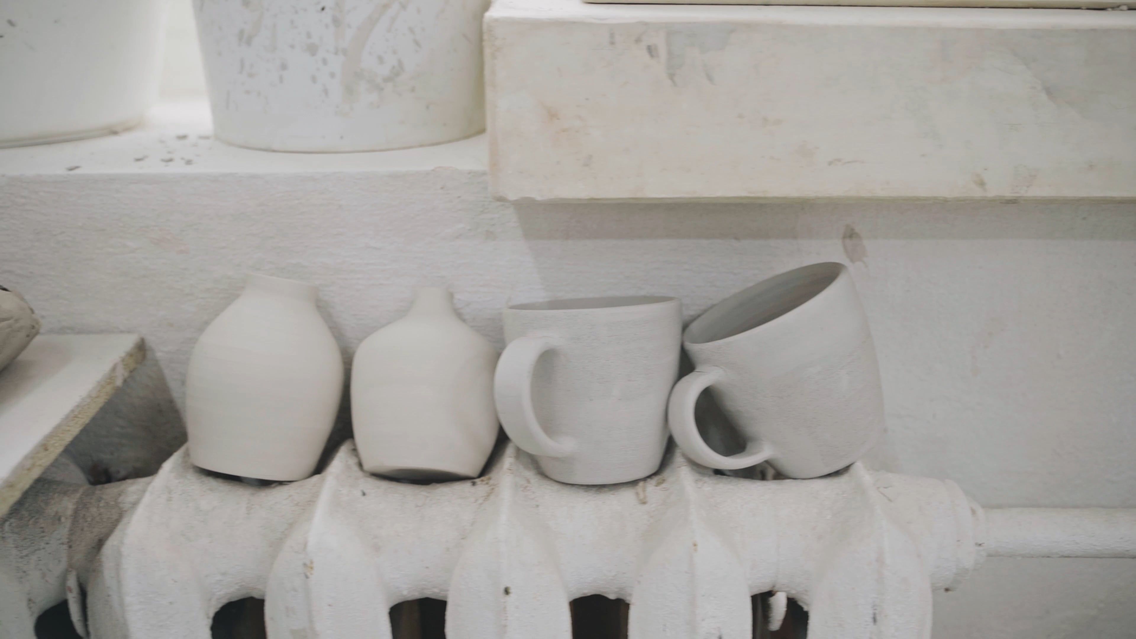 Set of glazed ceramic mugs