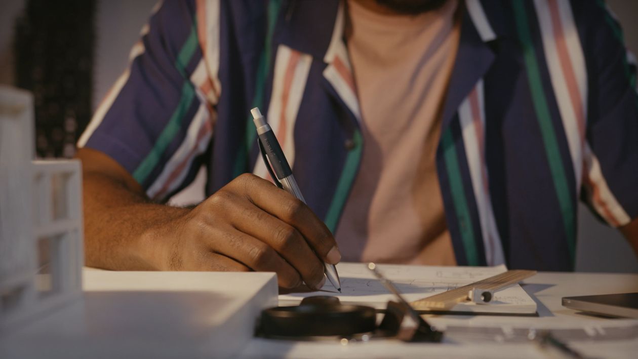 Man Using Weight To Write Man Writing on Paper Free Stock Video Footage, Royalty-Free 4K & HD ...