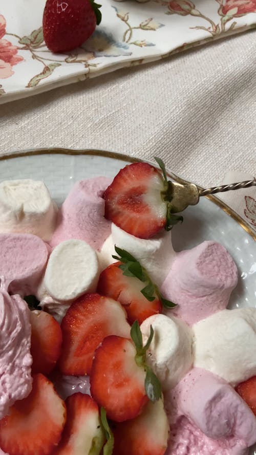 Dipping Strawberry in Melted Marshmallow