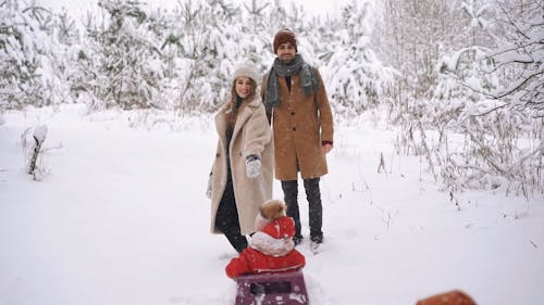 A Family Playing in the Snow