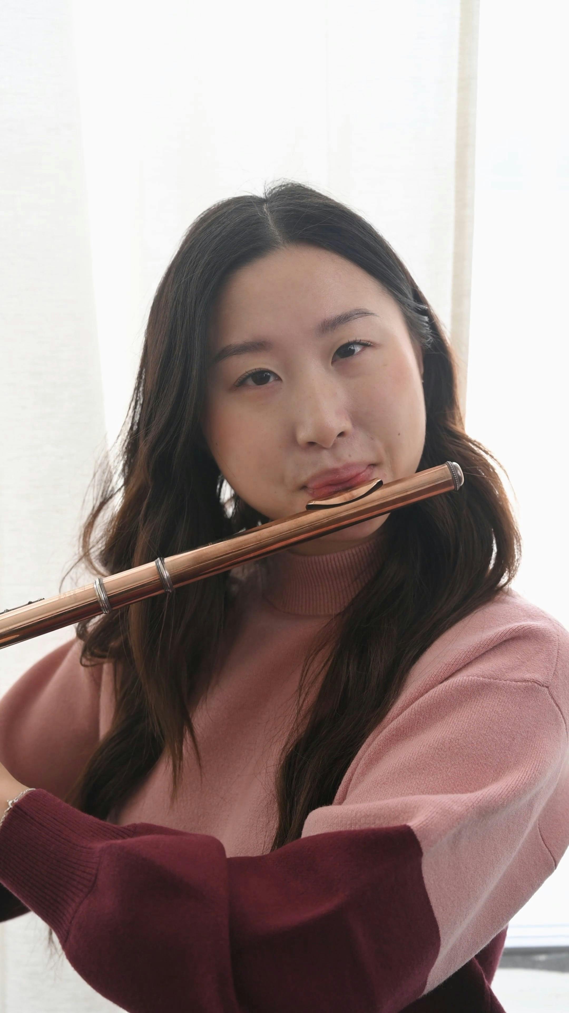 Woman Playing a Flute · Free Stock Video