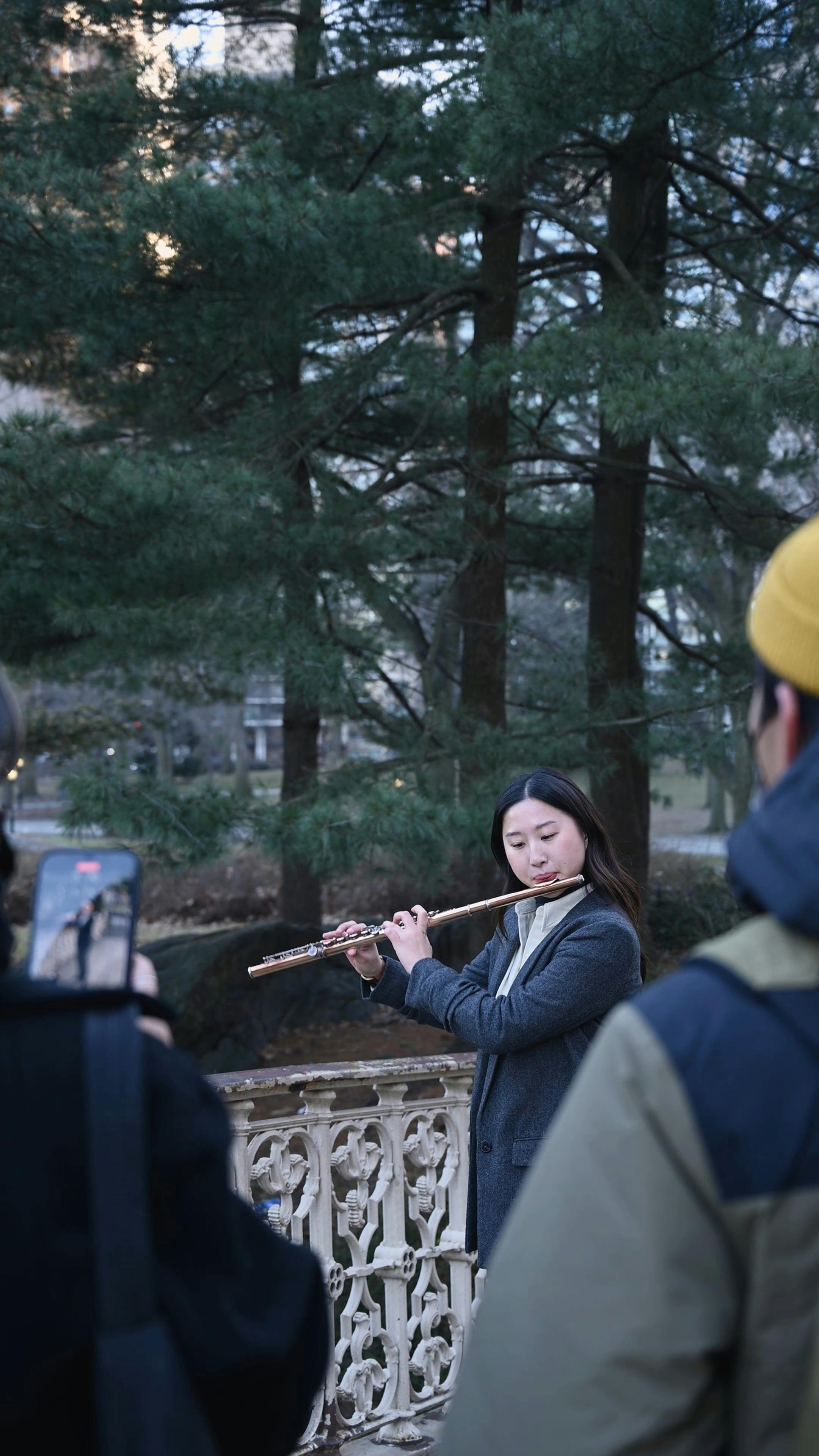 A Female Flutist Performing in Public · Free Stock Video