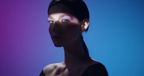 Woman With Spotlight On Eyes