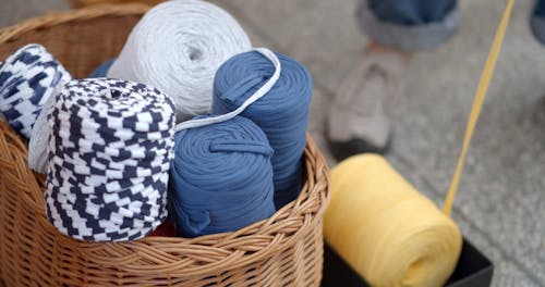 Rolls of Yarn in a Woven Basket