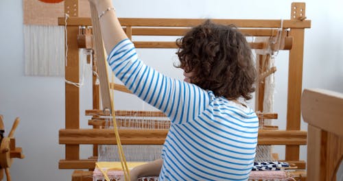 Woman Working on a Loom