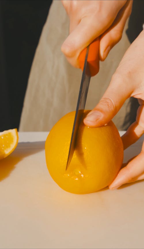 Slicing Orange with a Knife