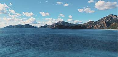 drone footage of green water in a sea