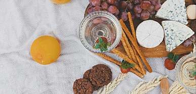 table set up of fruits and cookies