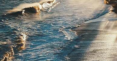 footage of waves hitting the beach shore