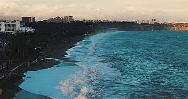 drone footage of waves at the seashore
