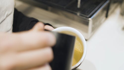 A Person Making a Latte Art