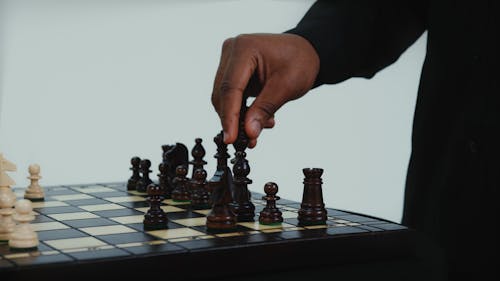 Close-Up Video of a Person Playing Chess