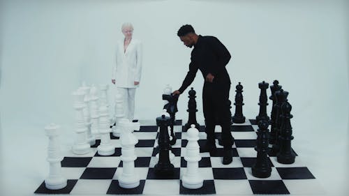 People Playing Giant Chess Game