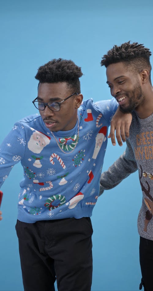 Men Wearing Christmas Sweater on a Video Call