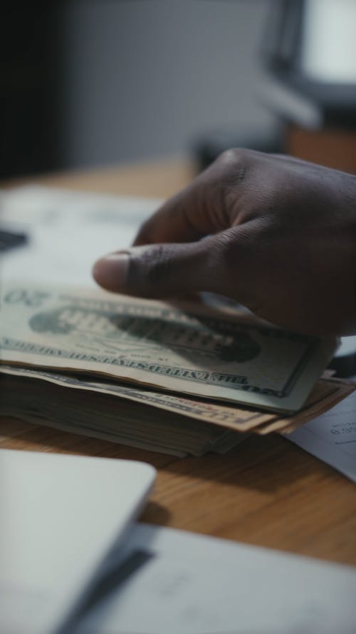 Man Calculating his Money