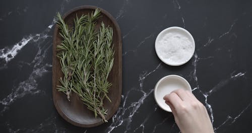 Preparing Salt and Rosemary Scrub