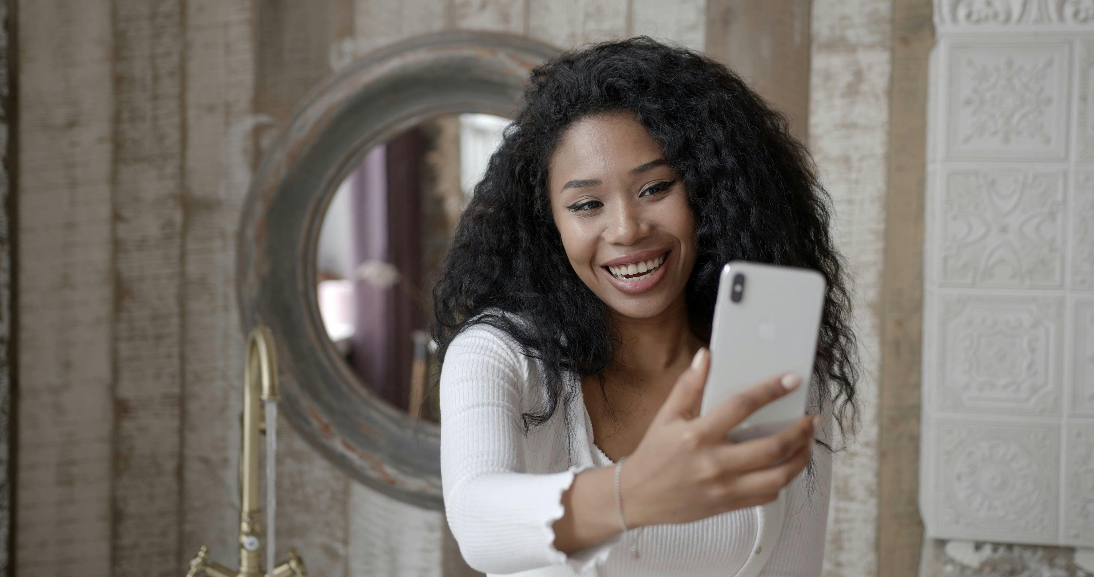 A Woman Having a Video Call on her Smartphone · Free Stock Video