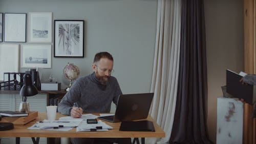 Man and Woman Talking in the Office