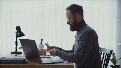 Man Counting Money in the Office