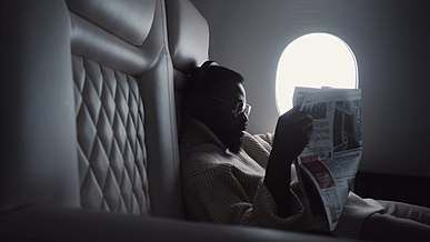 flipping pages of a newspaper