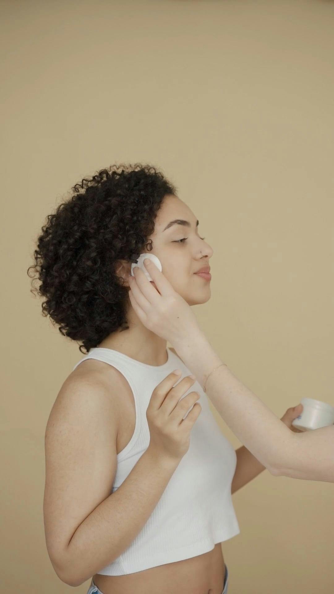Woman Applying Foundation On Her Face · Free Stock Video