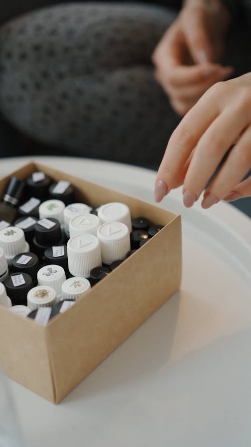 Woman Smelling Essential Oil