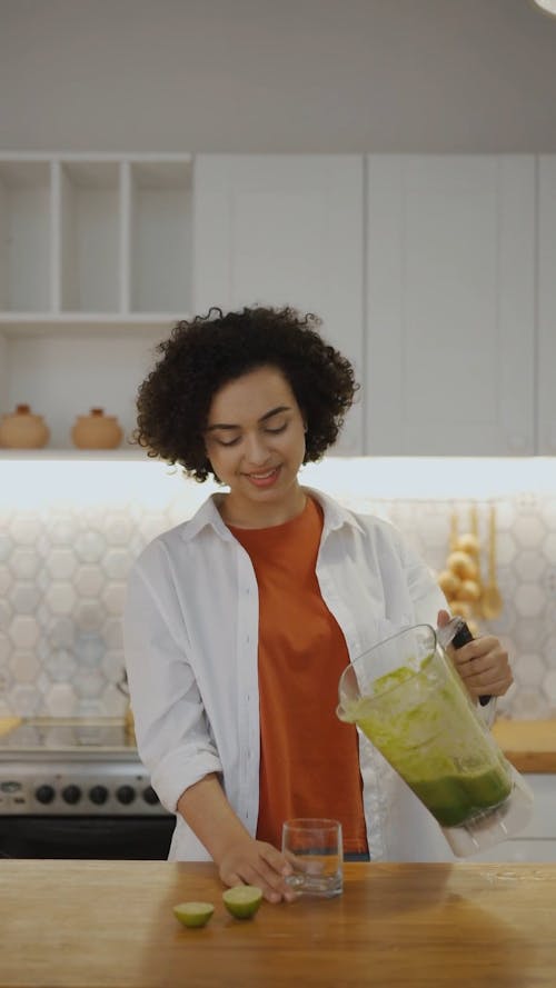 A Woman Drinking A Healthy Smoothie