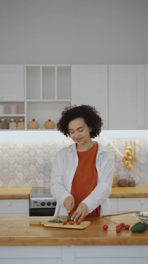 A Woman Preparing A Healthy Meal