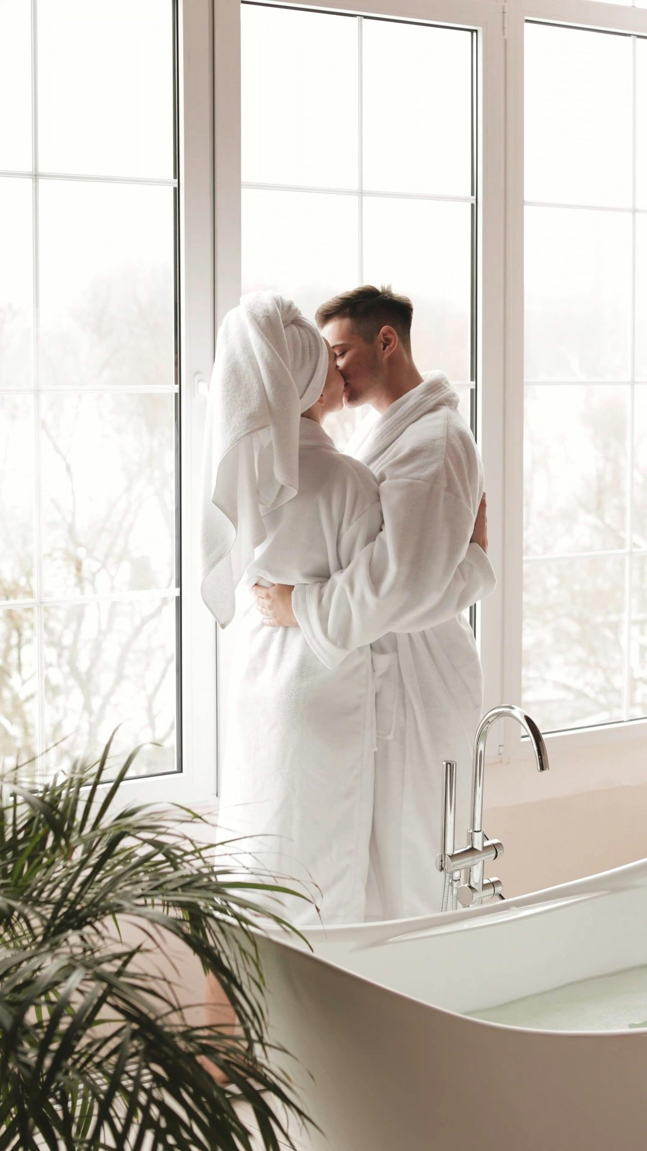 A Couple Wearing Bathrobes Kissing and Hugging Free Stock Video Footage,  Royalty-Free 4K & HD Video Clip