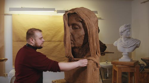 An Unfinished Sculpture Covered in Cloth