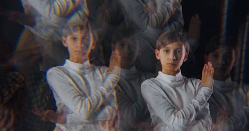 Footage of Young Models Posing with Kaleidoscope Effect