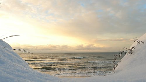 Fixed Shot of the Beach in Between the Snow