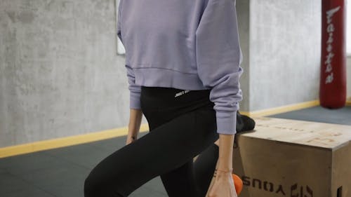 A Woman Doing Leg Exercises 