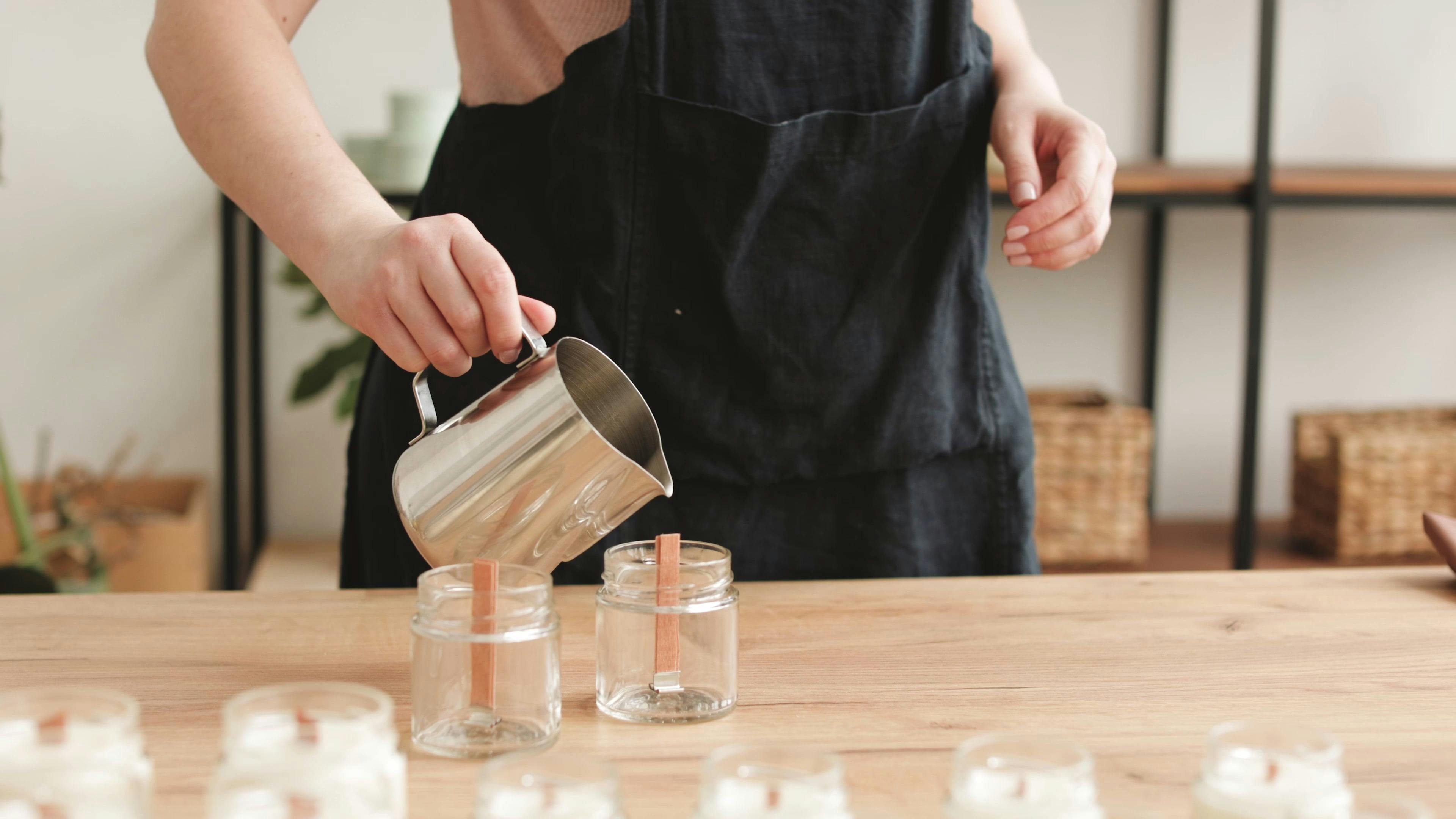 A Person Pouring the Melted Wax · Free Stock Video