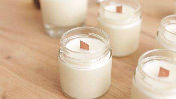 Candles curing on a shelf before burning
