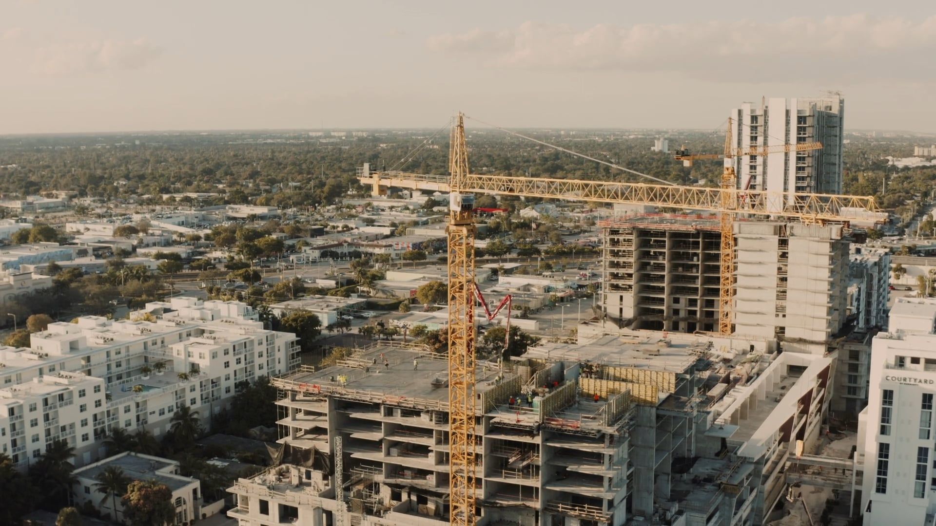 Drone Footage of a Tower Crane in Construction Site · Free Stock Video