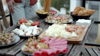 food served on wooden table outdoors