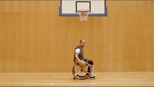 A Man Showing Hand Technique in Dribble