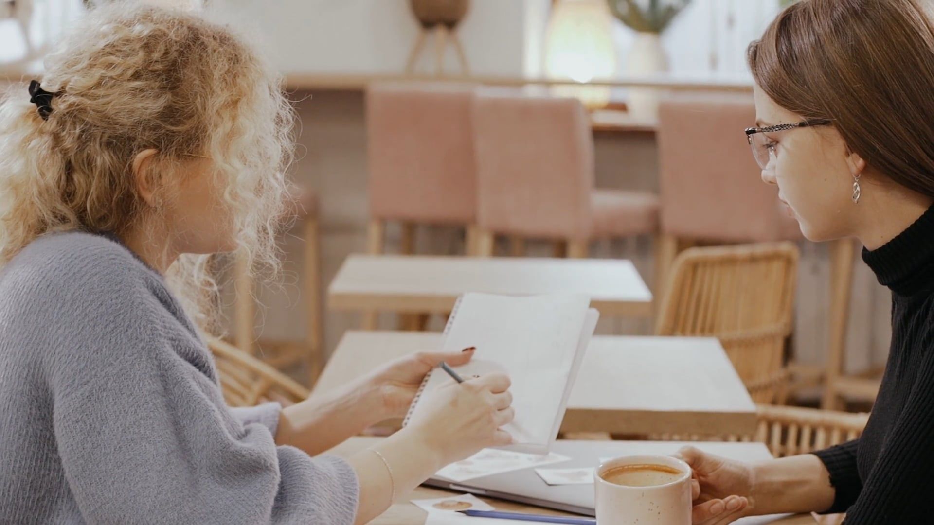 Woman Discussing while Writing in the Notebook Free Stock Video Footage ...