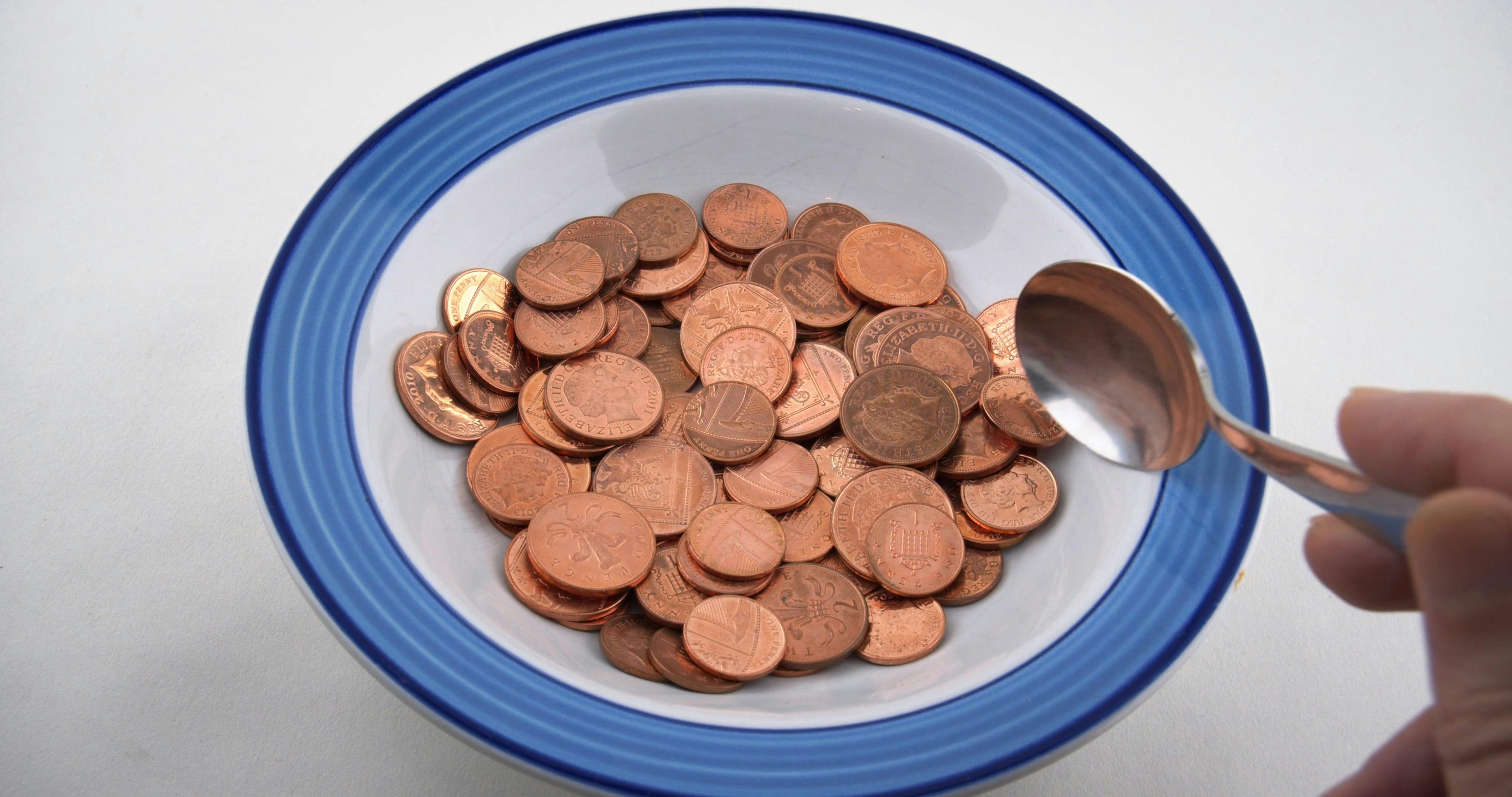 Soup Plate Full of Coins · Free Stock Video